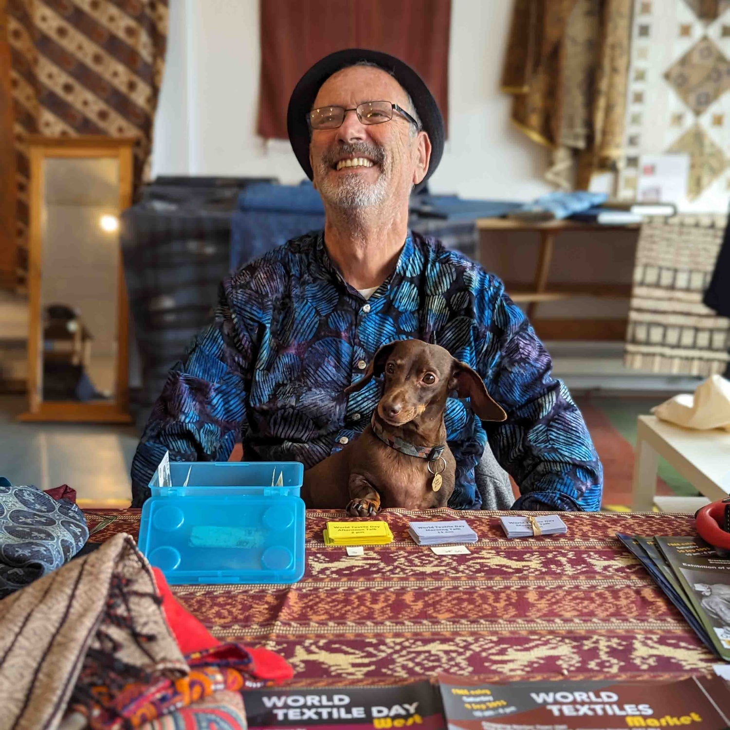 Jim Gaffney, founder of Textile Traders waits to welcome people to World Textile Day.